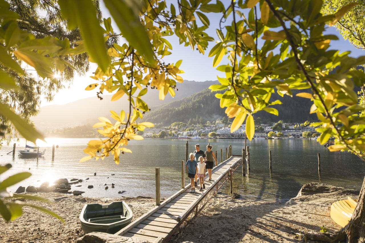 Family walking on pier - Queenstown Gardens, New Zealand holiday