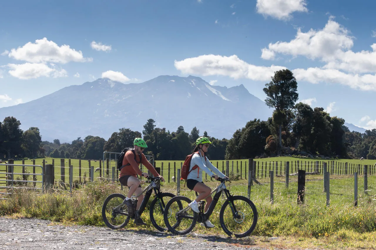Couple Biking the Ohakune Old Coach Road, Volcanic Loop Highway Road Trip