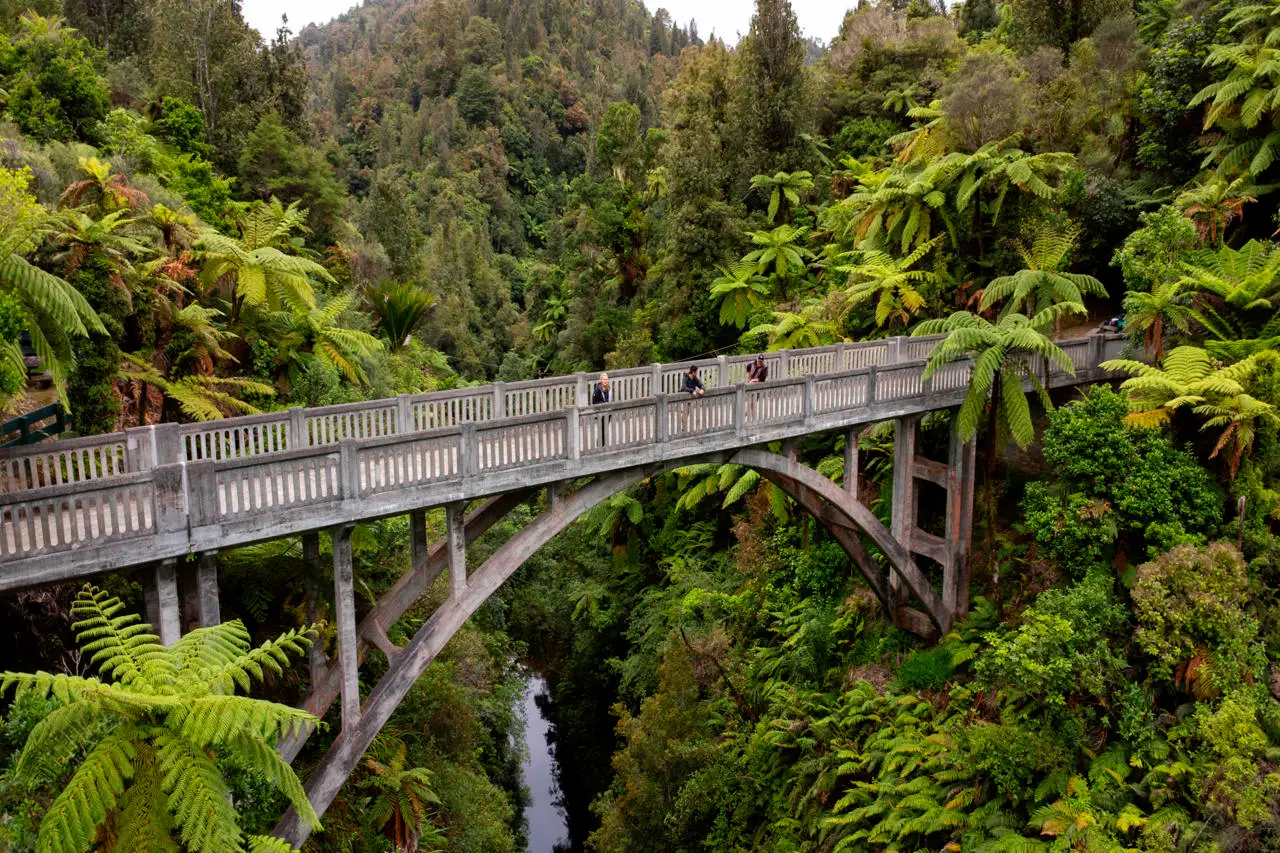 People Walking Along The Bridge To Nowhere